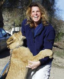 Dr. Jennifer Conrad of The Paw Project with lion cub.